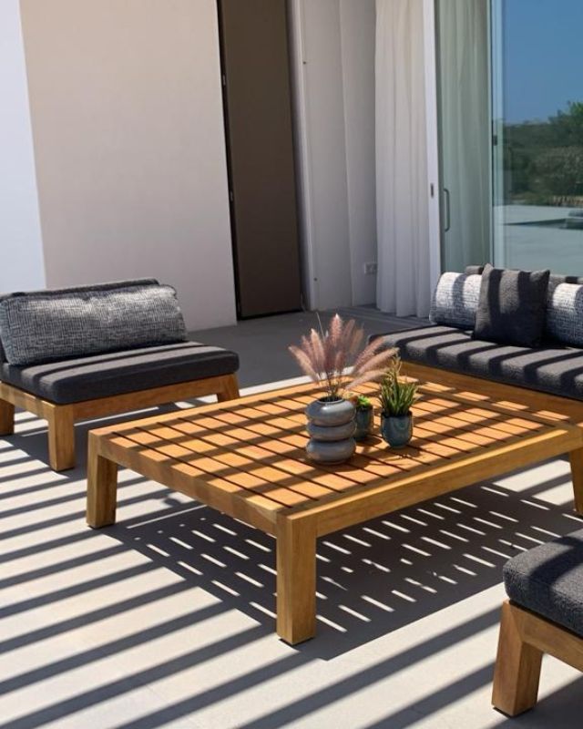 Luxury wooden outdoor lounge furniture, contract patio sofas, and hotel coffee tables by Grandeco